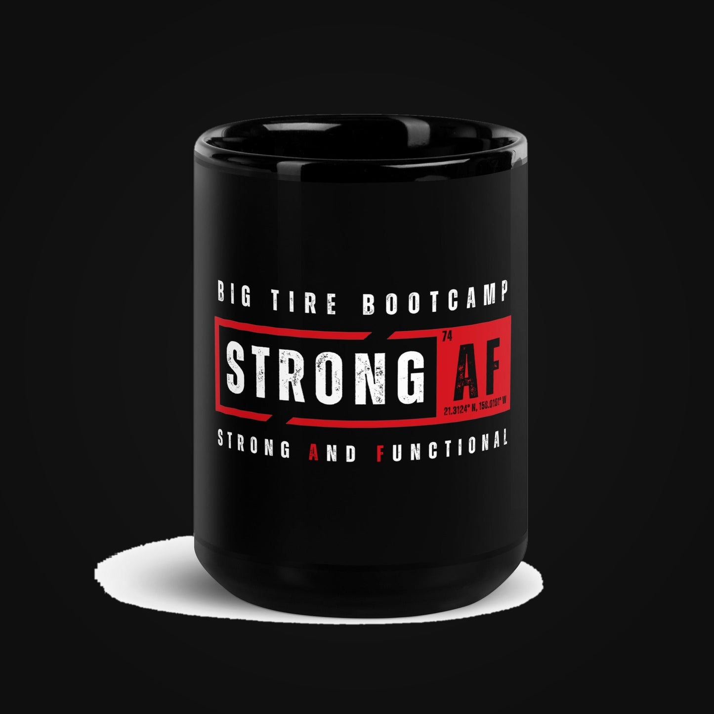 STRONG AF Black Glossy Ceramic Mug on dark