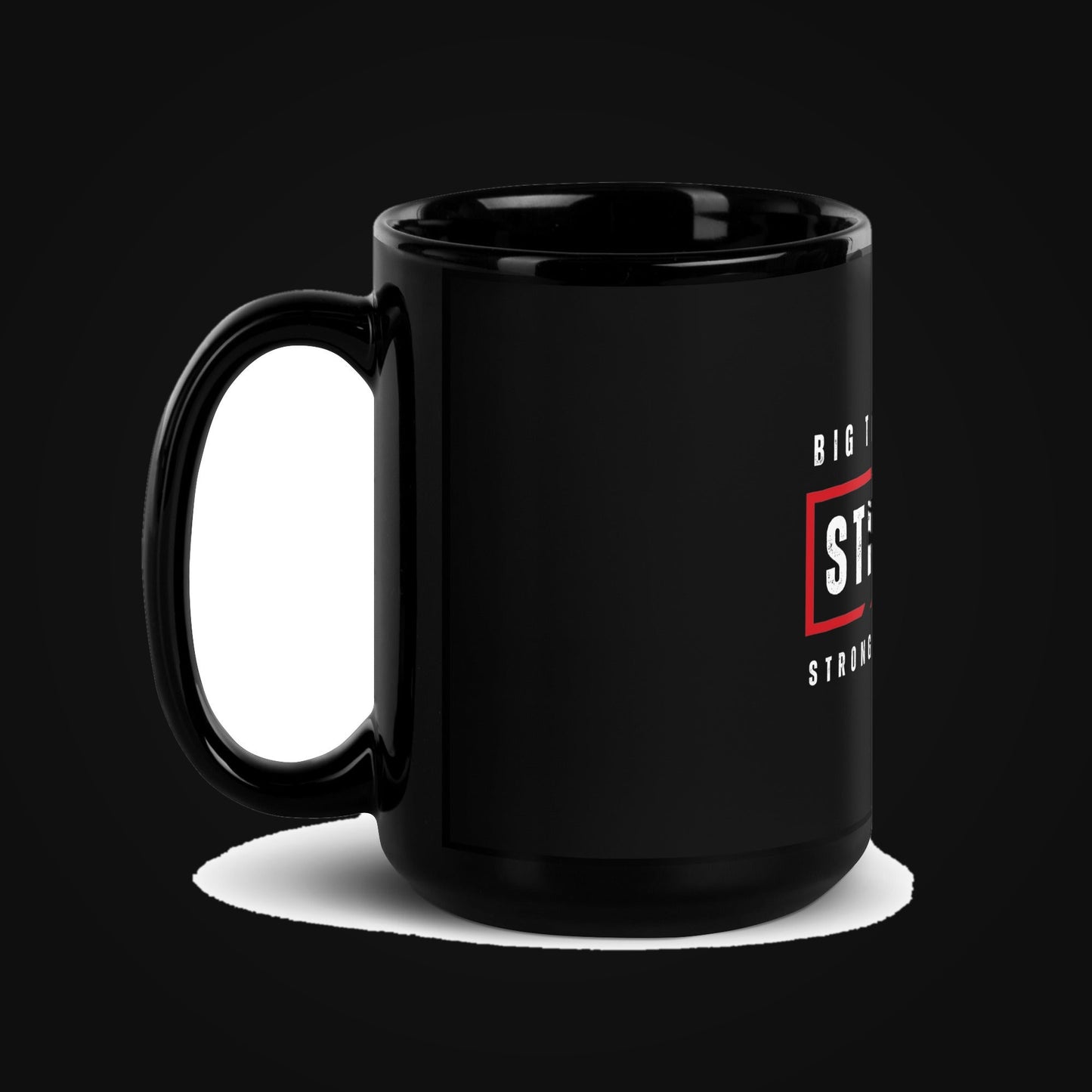 STRONG AF Black Glossy Ceramic Mug on dark