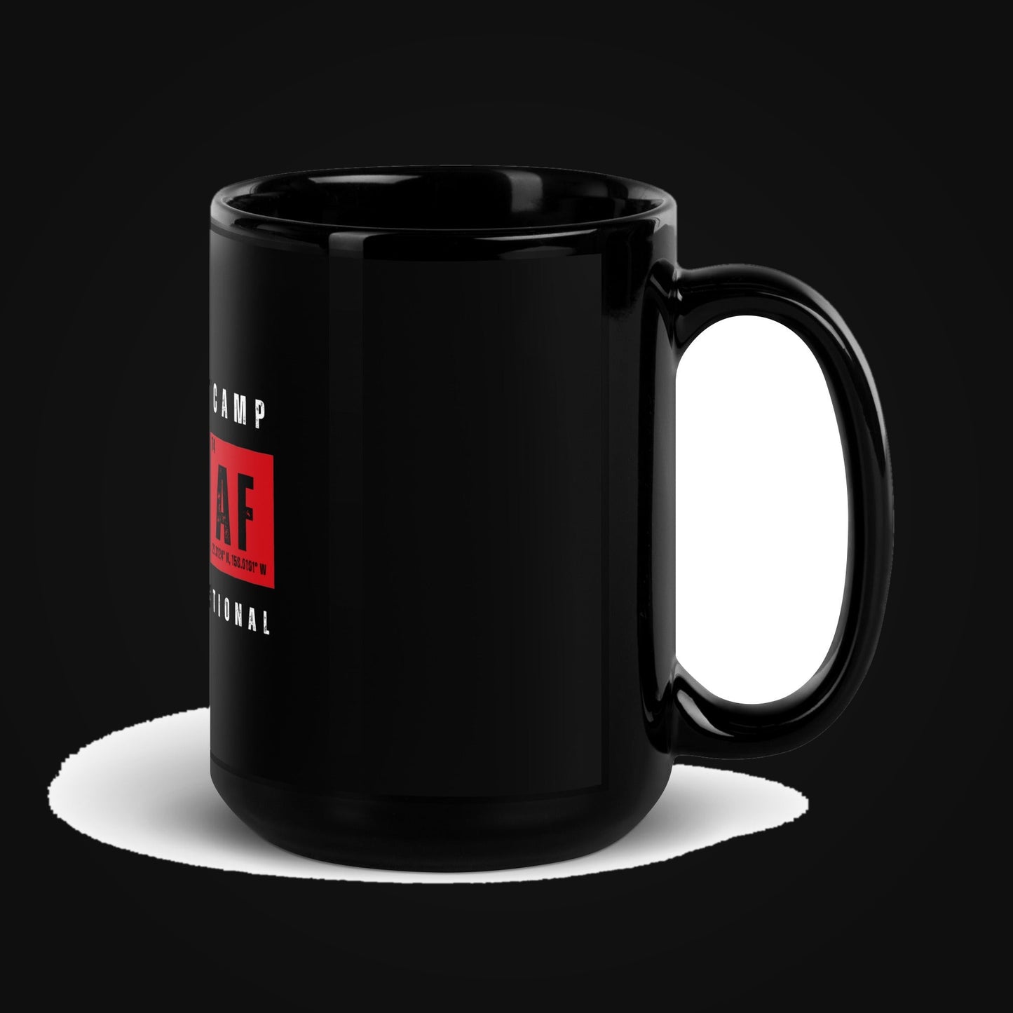 STRONG AF Black Glossy Ceramic Mug on dark