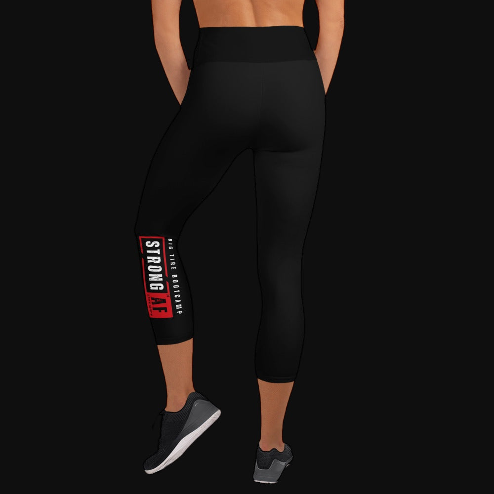 STRONG AF Yoga Capri Leggings – back view on model with side logo